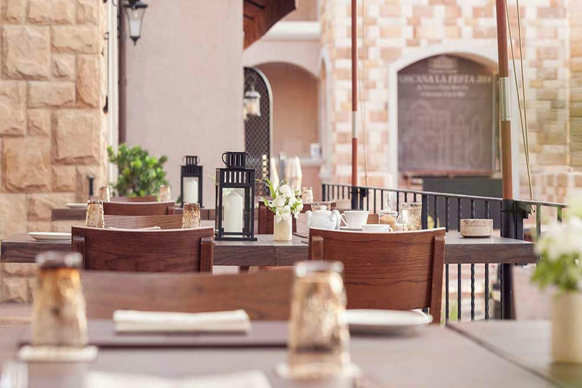 Toscana Town Square Suites Hotel