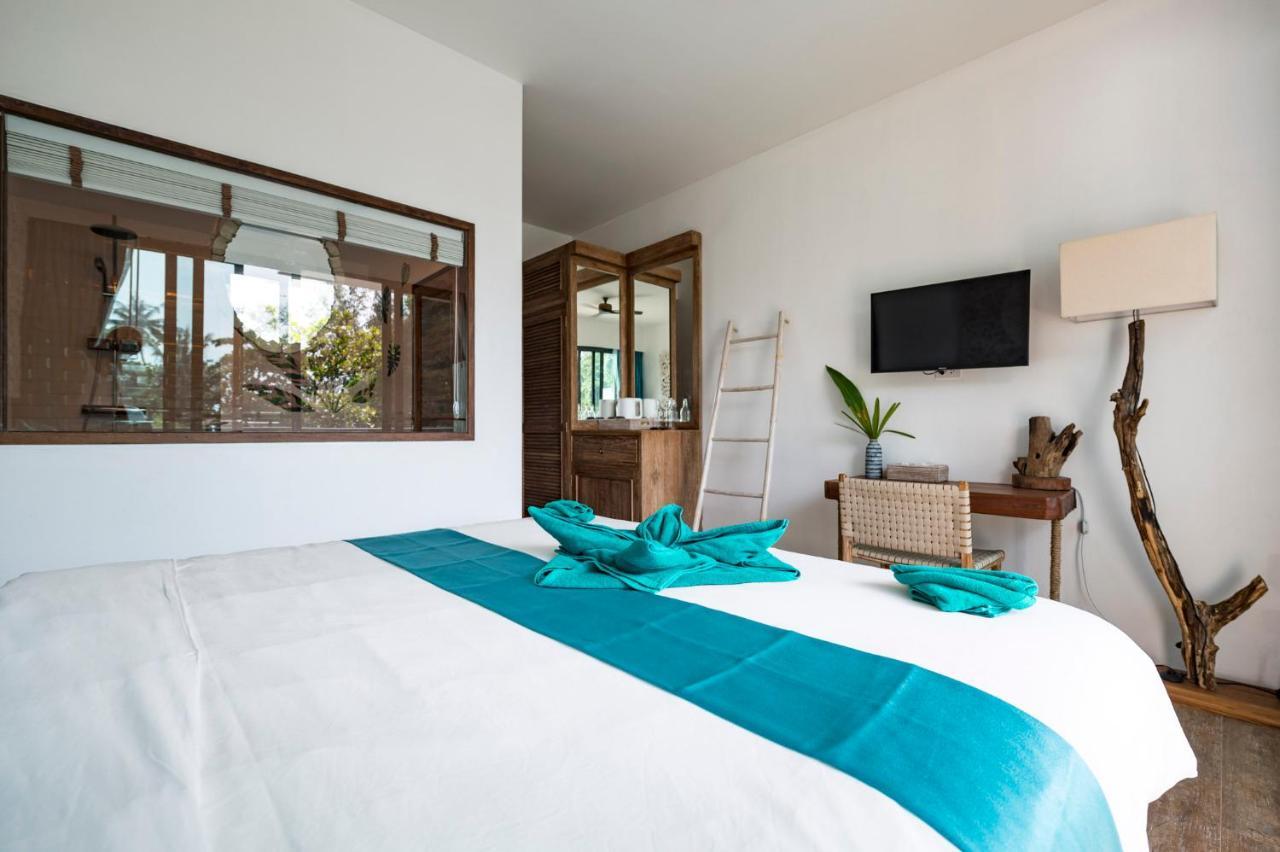By The Sea Boutique Inn *