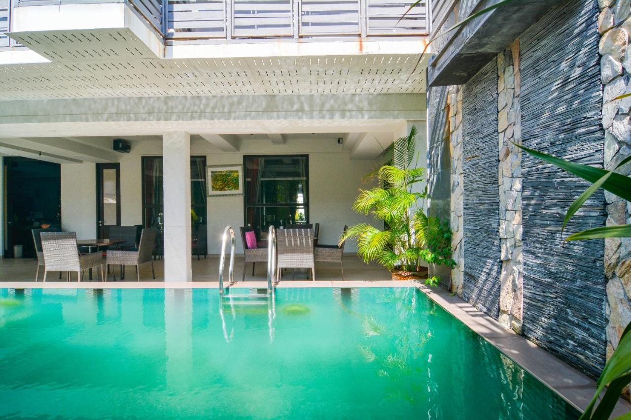 Oyo 115 Rich Boutique Hotel