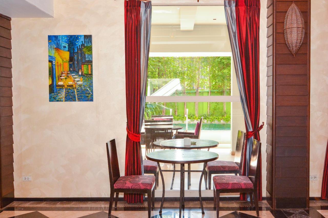 Oyo 115 Rich Boutique Hotel