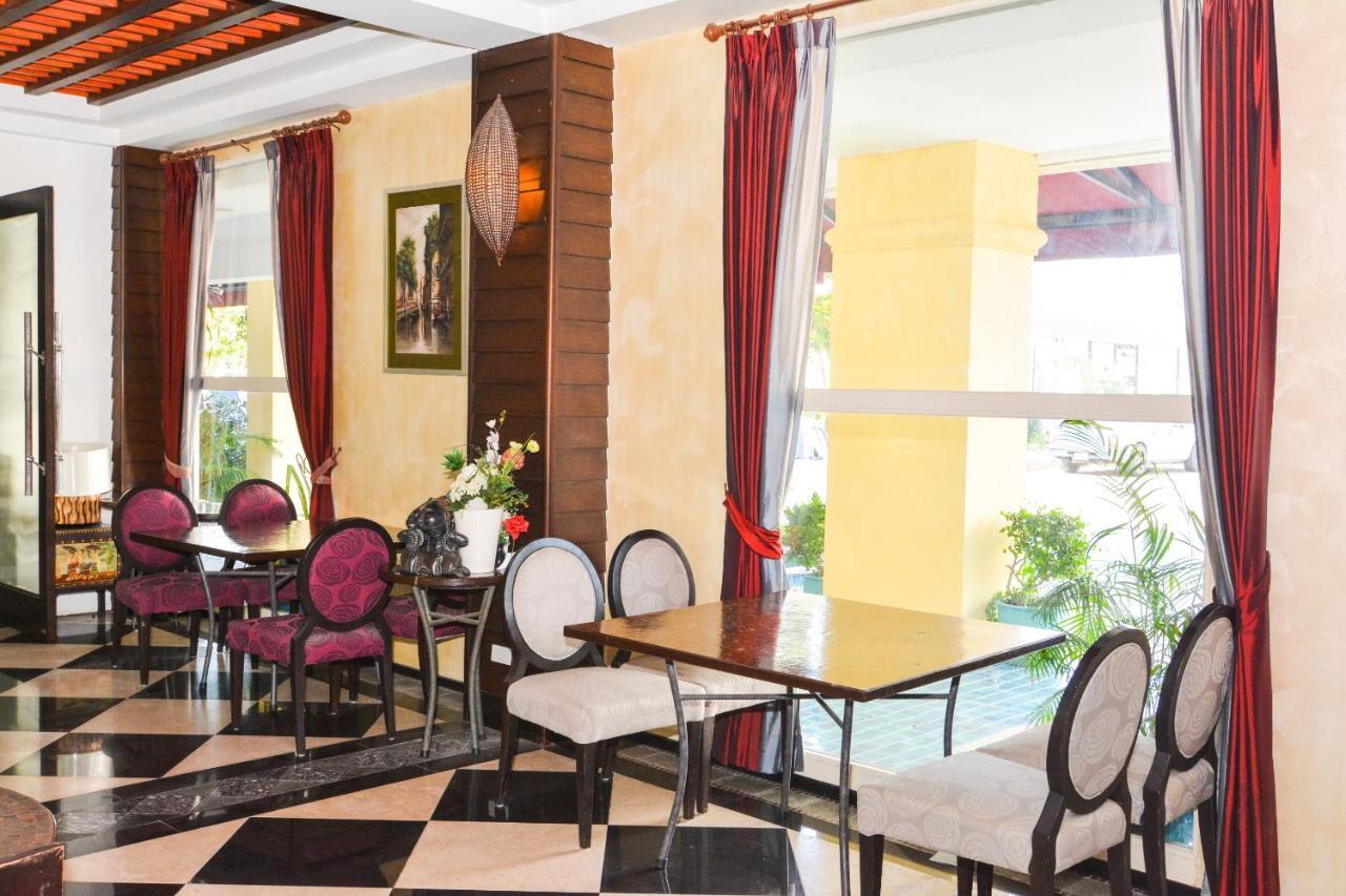 Hotel Oyo 115 Rich Boutique 2*