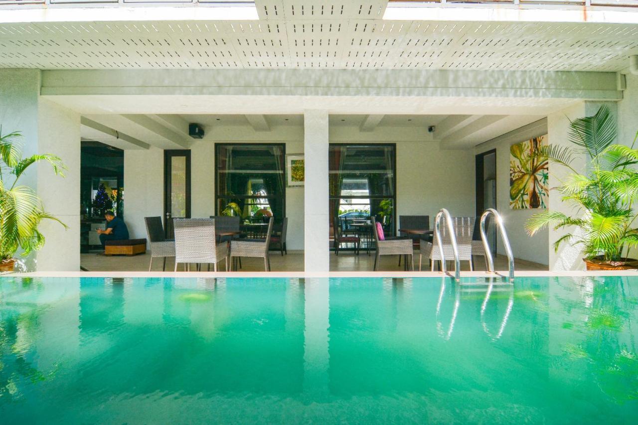 Oyo 115 Rich Boutique Hotel