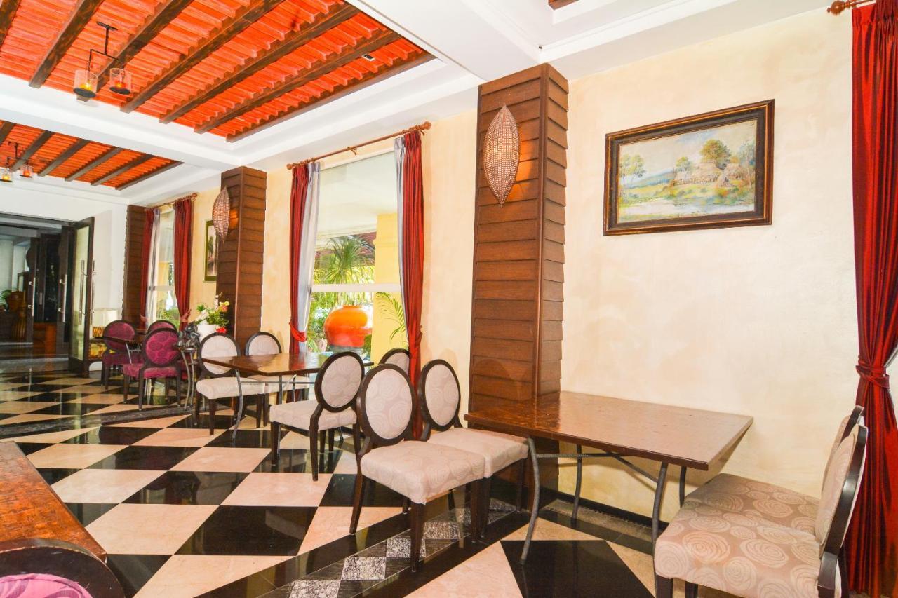 Oyo 115 Rich Boutique Hotel